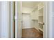 Walk-in closet with built-in shelving and ample storage space at 2150 W Alameda Rd # 1122, Phoenix, AZ 85085