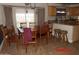 Dining room featuring wood dining set adjacent to the kitchen area at 22016 W Loma Linda Blvd, Buckeye, AZ 85326