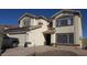 Two-story home showcasing desert landscaping and attractive architectural details at 22016 W Loma Linda Blvd, Buckeye, AZ 85326