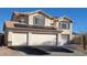 Two-story home with a three-car garage and solar panels on the roof at 22016 W Loma Linda Blvd, Buckeye, AZ 85326