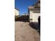 View of the side exterior of a home with the backyard fence and a partial view of the garage at 22016 W Loma Linda Blvd, Buckeye, AZ 85326