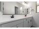 This bathroom has a double vanity with contemporary fixtures at 24116 N 172Nd Ave, Surprise, AZ 85387