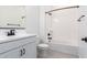 A well-lit bathroom with a shower and vanity at 24116 N 172Nd Ave, Surprise, AZ 85387