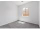 A bright bedroom with a window providing natural light at 24116 N 172Nd Ave, Surprise, AZ 85387