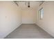 Single car garage offering ample parking and storage with a window allowing natural light at 24116 N 172Nd Ave, Surprise, AZ 85387