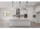Modern kitchen featuring a large island, stainless steel appliances, and plenty of storage at 24116 N 172Nd Ave, Surprise, AZ 85387