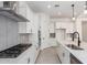 Spacious kitchen featuring stainless steel appliances, ample countertop space, and modern finishes at 24116 N 172Nd Ave, Surprise, AZ 85387