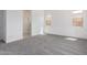 Cozy main bedroom features neutral carpet and an ensuite bathroom at 24116 N 172Nd Ave, Surprise, AZ 85387