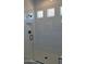 Walk-in shower with white tiles, glass door, and a built-in shelf at 24116 N 172Nd Ave, Surprise, AZ 85387