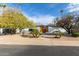 Modern house featuring desert landscaping, a large front yard, and a stylish facade at 2632 E Mountain View Rd, Phoenix, AZ 85028