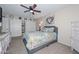 Bedroom featuring a bed, ceiling fan, natural light, closet and a dresser at 3004 W Anderson Dr, Phoenix, AZ 85053