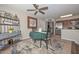 Charming dining area with a ceiling fan, adjacent to the kitchen, perfect for intimate meals at 3004 W Anderson Dr, Phoenix, AZ 85053