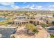 Aerial view of a community clubhouse boasting well manicured landscaping and stunning mountain views at 3089 E Hazeltine Way, Chandler, AZ 85249