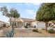 Charming single-story home featuring desert landscaping and a welcoming front patio with seating area at 3089 E Hazeltine Way, Chandler, AZ 85249