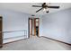 Bright bedroom with carpet floors and ceiling fan at 3522 E Fountain St, Mesa, AZ 85213