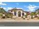 Beautiful single-Gathering home featuring stucco siding, terra cotta roof, mature landscaping, and a brick walkway at 3522 E Fountain St, Mesa, AZ 85213