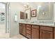 Bathroom features granite countertops, dual sinks, and decorative mirrors at 36600 N Cave Creek Rd # C17, Cave Creek, AZ 85331