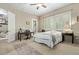 Neutral bedroom features a ceiling fan, natural light, and a private outdoor area at 36600 N Cave Creek Rd # C17, Cave Creek, AZ 85331