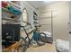 Spacious closet with organization system and plenty of room for storage or activities like bike repair at 36600 N Cave Creek Rd # C17, Cave Creek, AZ 85331