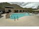 Enjoy the community pool and outdoor seating with mountain views at 36600 N Cave Creek Rd # C17, Cave Creek, AZ 85331