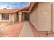 The front entrance of this home features a walkway and desert landscaping at 372 W Larona Ln, Tempe, AZ 85284