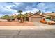 Charming single-story home with well-maintained landscaping and an attached two-car garage at 372 W Larona Ln, Tempe, AZ 85284