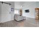 Inviting living room featuring new flooring, and a large grey sectional sofa at 372 W Larona Ln, Tempe, AZ 85284