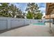 Sparkling pool and spa surrounded by a paved patio and block fence for privacy at 372 W Larona Ln, Tempe, AZ 85284