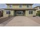 Spacious backyard featuring a covered patio area, pavers, gravel, and a well-maintained lawn at 3901 S Adobe Dr, Chandler, AZ 85286