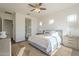 Serene bedroom boasts natural light, neutral decor and a cozy rug, creating a peaceful retreat at 3901 S Adobe Dr, Chandler, AZ 85286