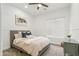 Inviting bedroom showcasing neutral tones, a comfortable bed, soft carpet, and natural light at 40614 N Harbour Town Ct, Anthem, AZ 85086