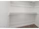 Walk-in closet with shelving and carpet at 4402 E Mitchell Dr, Phoenix, AZ 85018