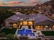 Panoramic aerial view of luxury home featuring a modern pool, and roof top patio with mountain views at 5301 E Paradise Canyon Rd, Paradise Valley, AZ 85253