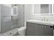 Bathroom featuring a modern vanity and glass shower with stylish tile work and gold fixtures at 5301 E Paradise Canyon Rd, Paradise Valley, AZ 85253