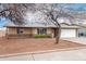 Charming single-story home featuring a two-car garage, brick accents, and a well-maintained front yard at 5401 S Siesta Ln, Tempe, AZ 85283