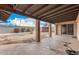 Covered patio with sliding door and ample space for outdoor entertaining and relaxation at 5401 S Siesta Ln, Tempe, AZ 85283