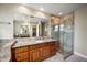 Bathroom features a glass shower, granite vanity, and elegant tile accents at 567 W 6Th St, Tempe, AZ 85281