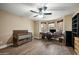 Bright bedroom with hardwood floors, ceiling fan, bay window, and office space at 567 W 6Th St, Tempe, AZ 85281