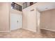 Spacious entryway featuring tile flooring and high ceilings with a view of the second floor at 73 E Caroline Ln, Tempe, AZ 85284