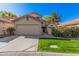 Charming single-Gathering home featuring a well-maintained lawn and a two-car garage at 73 E Caroline Ln, Tempe, AZ 85284