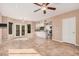 Bright living area features tile flooring and access to the exterior through stylish French doors at 73 E Caroline Ln, Tempe, AZ 85284