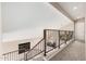 Second floor landing showcasing a neutral color scheme, carpet, railing, and an open staircase at 73 E Caroline Ln, Tempe, AZ 85284