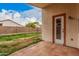 The backyard is fenced with a small patio and minimal desert landscaping at 7929 W Wescott Dr, Glendale, AZ 85308