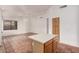 Spacious living room with tile flooring and a ceiling fan at 7929 W Wescott Dr, Glendale, AZ 85308