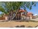 Charming two-story home with a red tile roof, and driveway at 956 N 58Th St, Mesa, AZ 85205