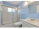 Well-lit bathroom with a shower-tub combination and modern vanity at 962 E Greenway St, Mesa, AZ 85203