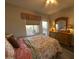 Comfortable bedroom with a window view and well-maintained furniture at 9750 N Monterey Dr # 67, Fountain Hills, AZ 85268