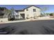 Two-story home featuring a two-car garage, neutral exterior, and desert landscaping at 9750 N Monterey Dr # 67, Fountain Hills, AZ 85268