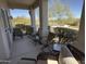 Relaxing covered patio with comfortable seating, perfect for enjoying the outdoors at 9750 N Monterey Dr # 67, Fountain Hills, AZ 85268