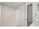 This bathroom has a combined tub and shower, and is next to the vanity and sink at 10317 W Desert Forest Cir, Sun City, AZ 85351
